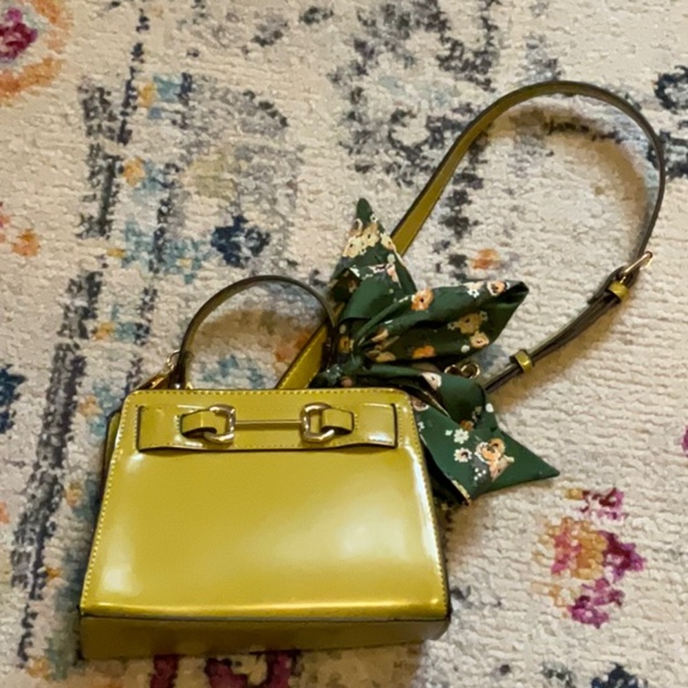 Elegant Green Handbag with Floral Scarf Accent